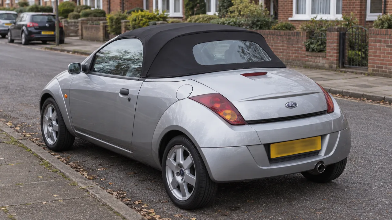 Ford Streetka parked with its fabric roof raised, showing the restricted view through its rear quarters.